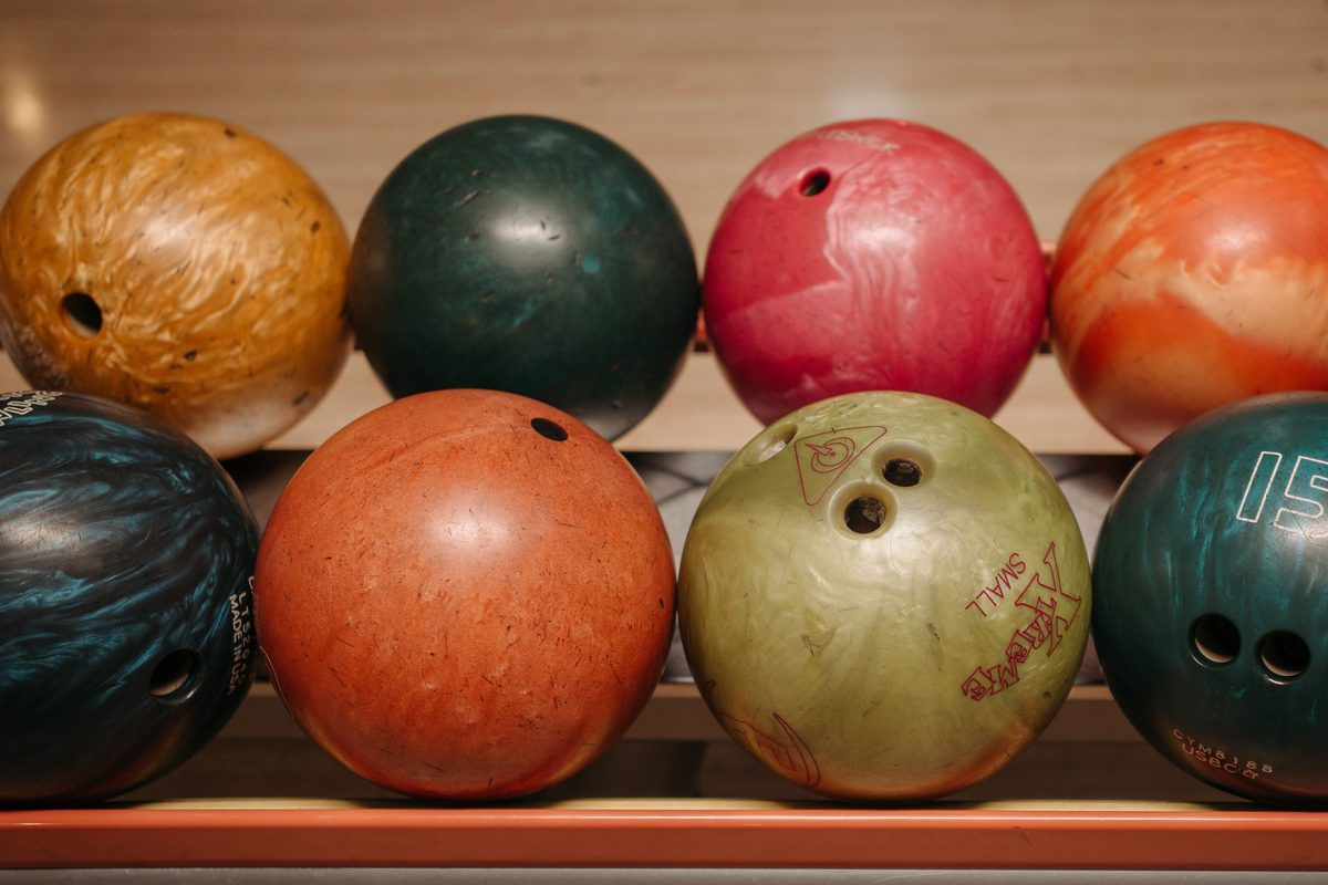 Shelves of colourful bowling balls, the first bowling equipment most new bowlers use