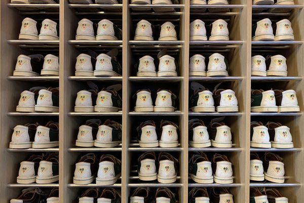 Shelves of rental bowling shoes at a bowling centre