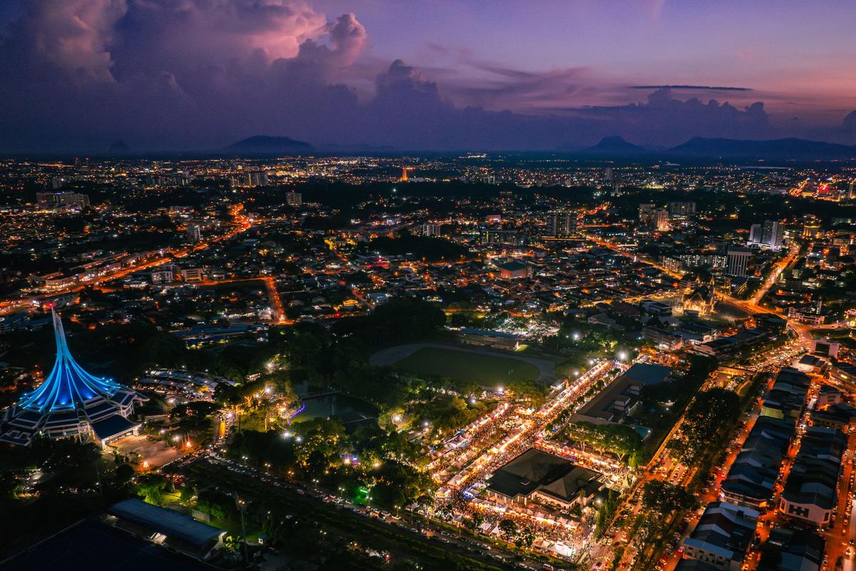 Kuching at night beside the Sarawak River, home to the busiest bowling alleys in Sarawak